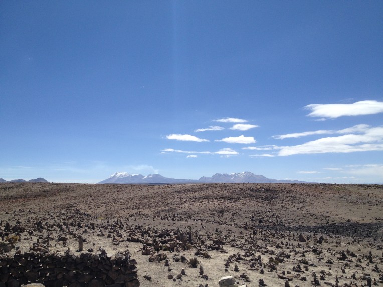 little stone piles and volcano // A Slice of Peru