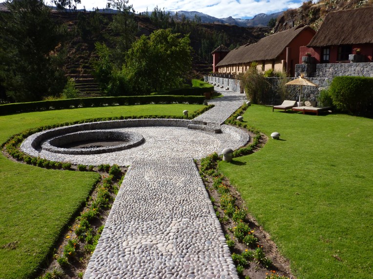 alpacas in a stone pathway - Colca Lodge // A Slice of Peru